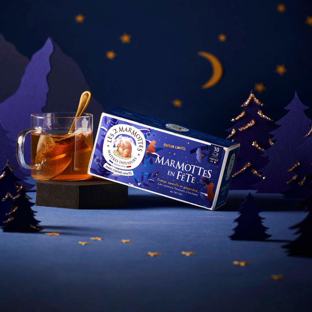 Tisane de Noël Marmottes en Fête : tisane orange, cannelle, gingembre, saveurs authentiques sans arômes ajoutés. Idée cadeau Noel Secret Santa pour fans d'infusions.