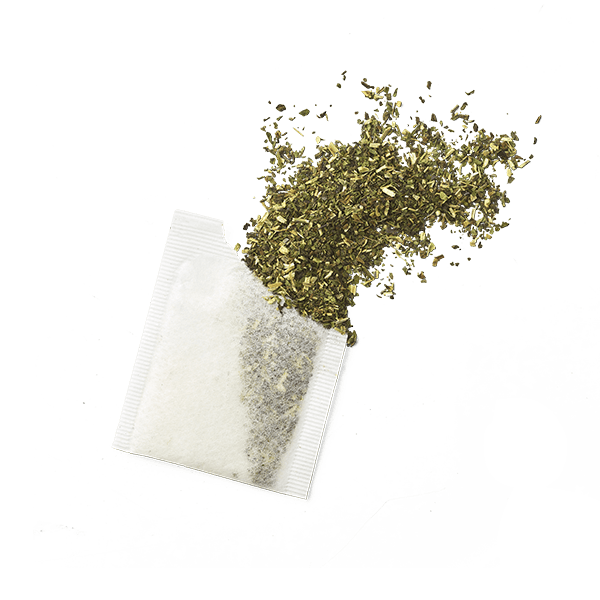 Sachet de tisane ouvert pour montrer la menthe