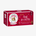 Thé de noel les 2 marmottes : thé en fête. Thé noir bio 100% plantes, sans arômes ajoutés. Thé noir, cacao, cannelle, pour un thé d'hiver réconfortant et chaleureux. Idée cadeau noel, idée cadeau secret santa. Fabriqué en France. Boîte de 30 sachets, décor festif rouge et or, illustrations de marmottes dans un décor hivernal. Edition limitée.