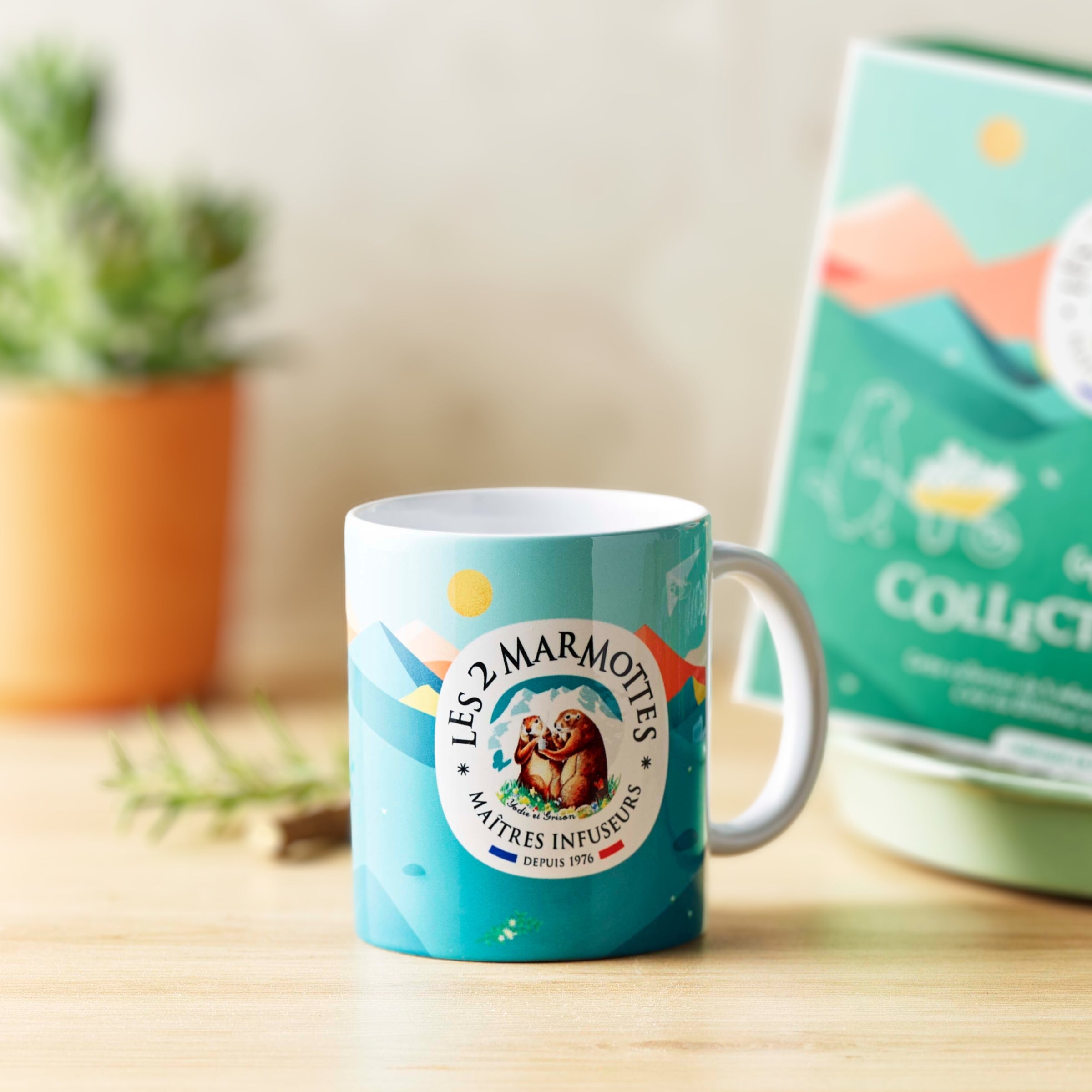 Mug vert décor de montagne les 2 marmottes, assorti au coffret cadeau tisanes et thés Collection Bio