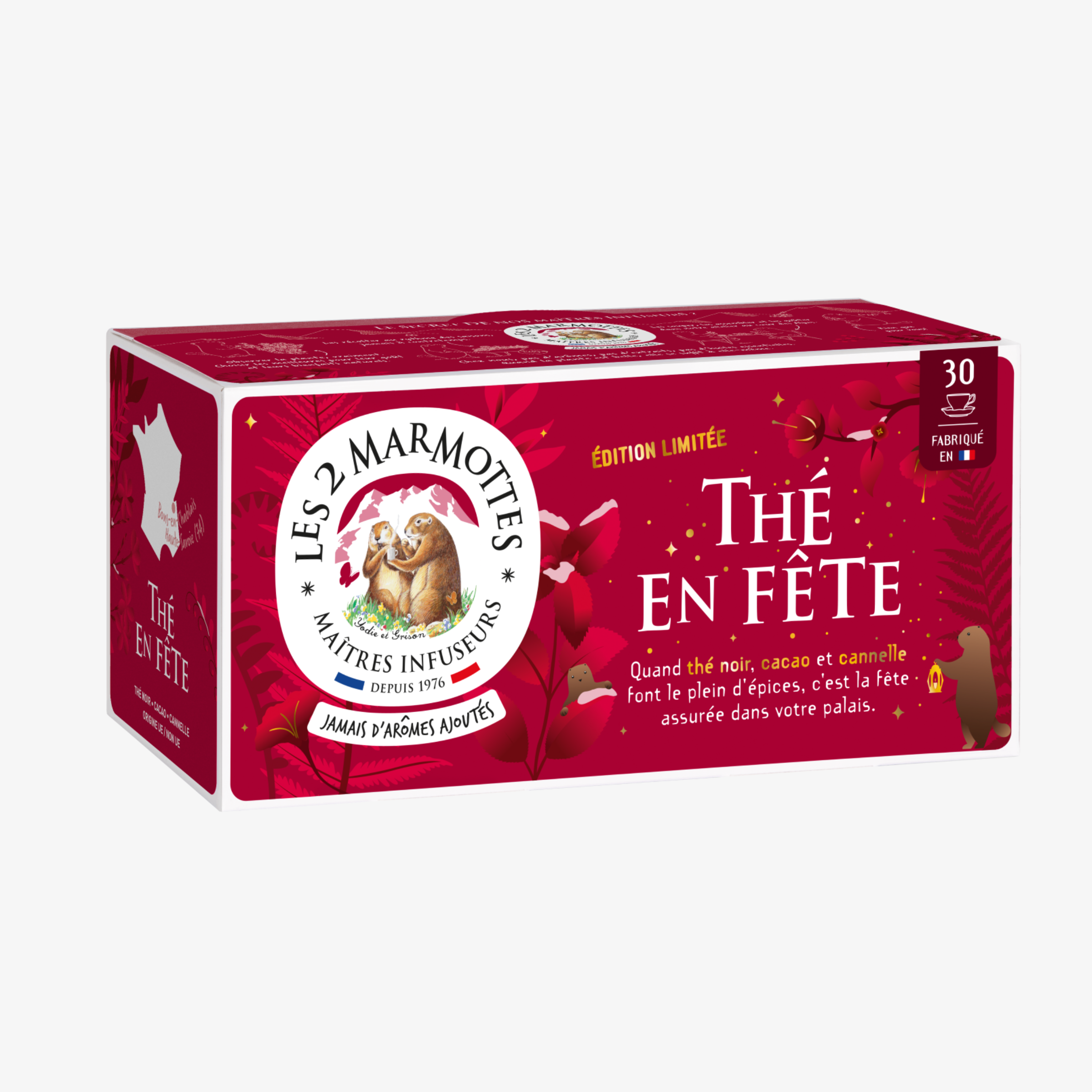 Thé de noel les 2 marmottes : thé en fête. Thé noir bio 100% plantes, sans arômes ajoutés. Thé noir, cacao, cannelle, pour un thé d'hiver réconfortant et chaleureux. Idée cadeau noel, idée cadeau secret santa. Fabriqué en France. Boîte de 30 sachets, décor festif rouge et or, illustrations de marmottes dans un décor hivernal. Edition limitée.